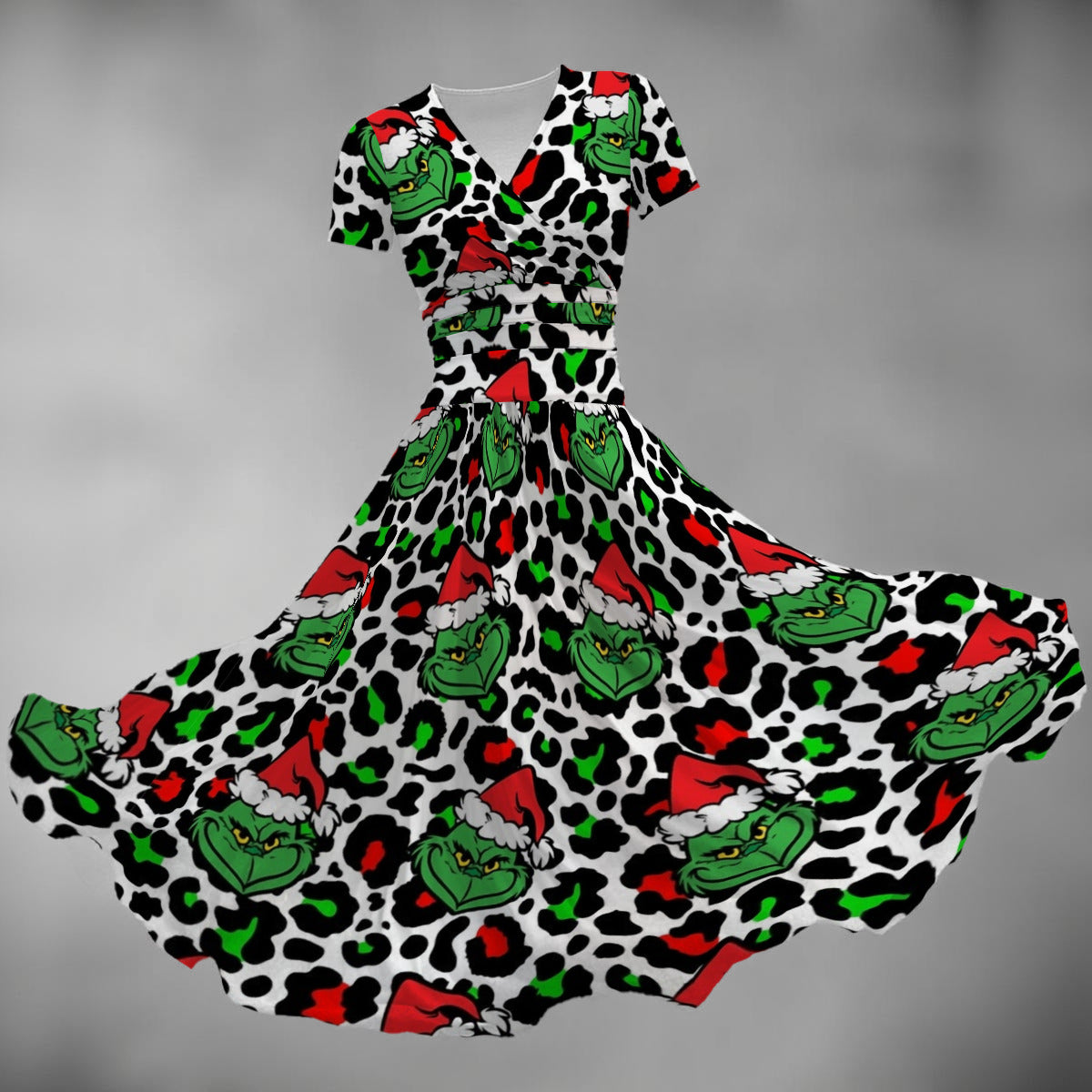 Dress with Grinch pattern on a gray background