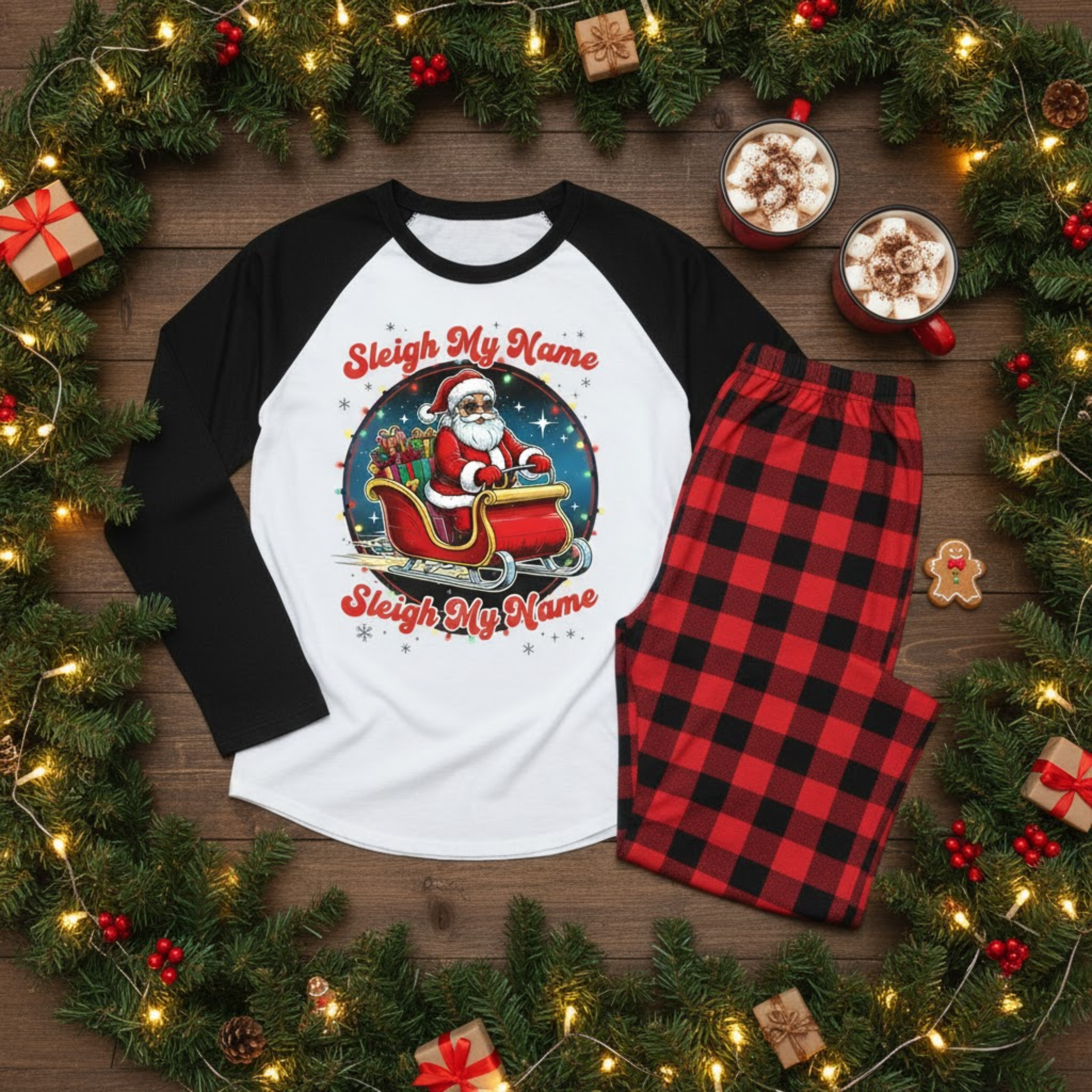 Christmas pajama set featuring a raglan sleeve top with a "Sleigh My Name" Santa graphic and red buffalo plaid pants, surrounded by festive decor.